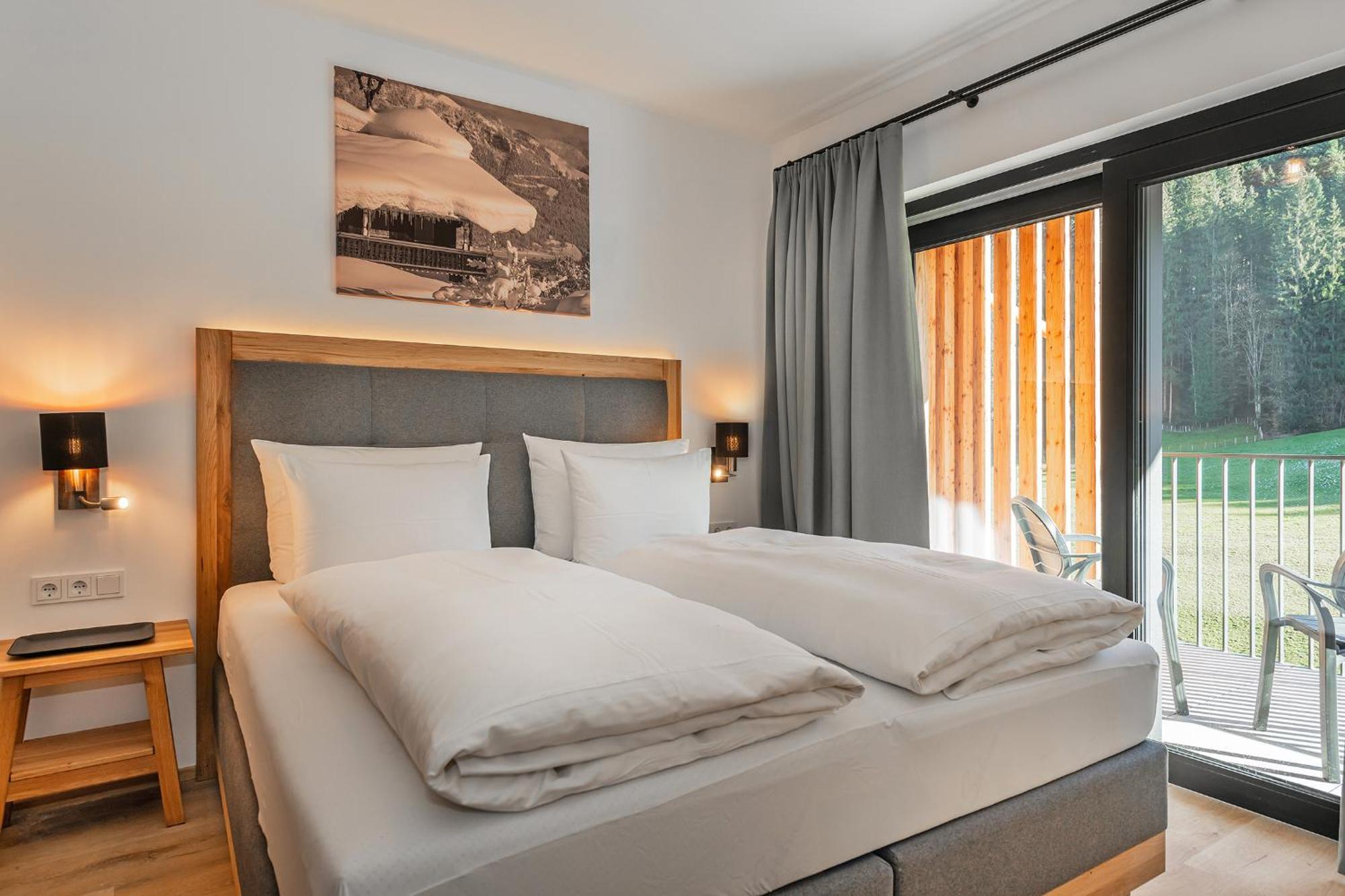 Alpenparks Hotel & Apartment Taxacher Kirchberg in Tirol Exterior photo
